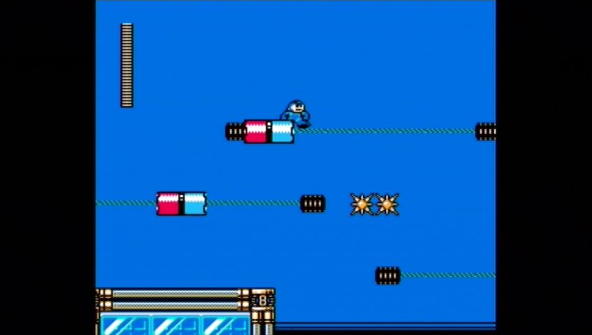 Mega Man 9 (Xbox 360) screenshot: Mega Man can get stuck on these magnetic rotating platforms.