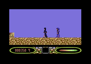 Elvira: The Arcade Game (Commodore 64) screenshot: These cloaked figures throw fire balls.