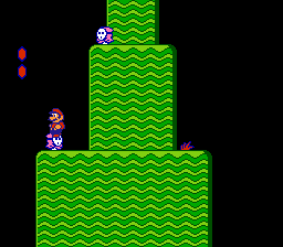 Super Mario Bros. 2 (NES) screenshot: In this game, hopping on an enemy doesn't squish them.