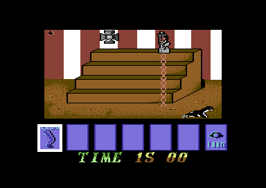 Inspector Gadget and the Circus of !!Fear!! (Commodore 64) screenshot: Using Gadget's extendable legs