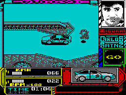Carlos Sainz (ZX Spectrum) screenshot: The black dot confused me for most of my first lap. At first I thought it was some sort of guide and tried to follow it. Its actually the shadow of a bird that flies over the course