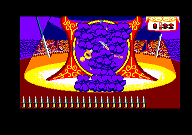 Fiendish Freddy's Big Top O' Fun (Amstrad CPC) screenshot: A clown dropped a smoke bomb to make it hard for me to see