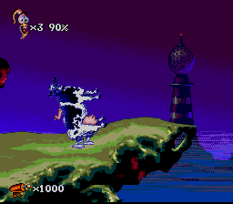 Earthworm Jim 2 (SNES) screenshot: Picking up a cow! Wow!!