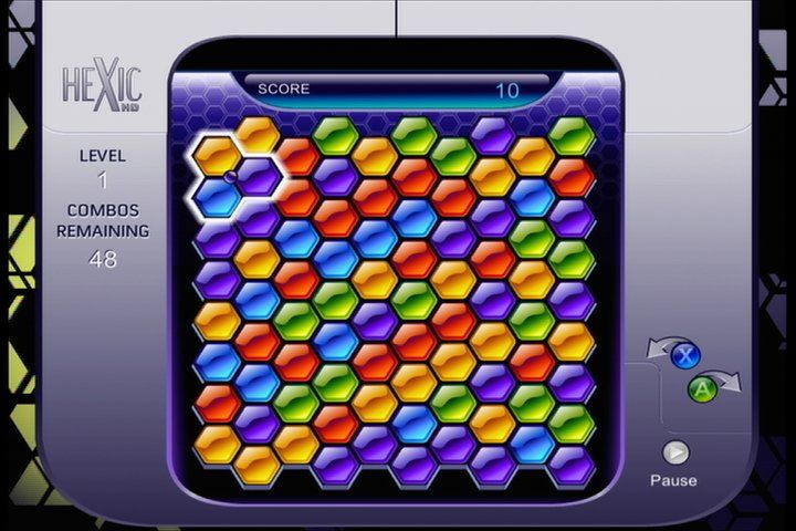 Hexic (Xbox 360) screenshot: Doing a rotation here will form a cluster with the purple hexagons and cause them to disappear.