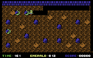 Emerald Mine (Commodore 64) screenshot: Picking up emeralds