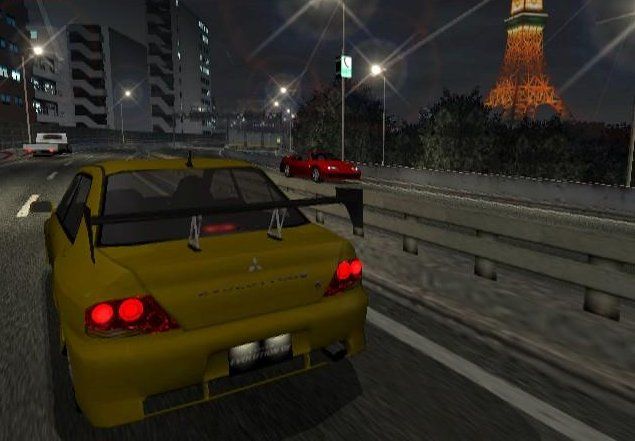 Tokyo Xtreme Racer 3 (PlayStation 2) screenshot: Evo 7 crusing past the Tokyo Tower