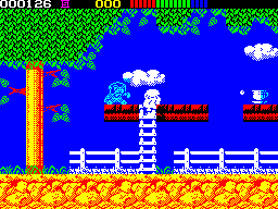 Impossamole (ZX Spectrum) screenshot: ORIENT level : The blue thing fires bullets every 2 seconds or so - so its important to time the climb and the jump for the bonus item, the cup of tea, carefully