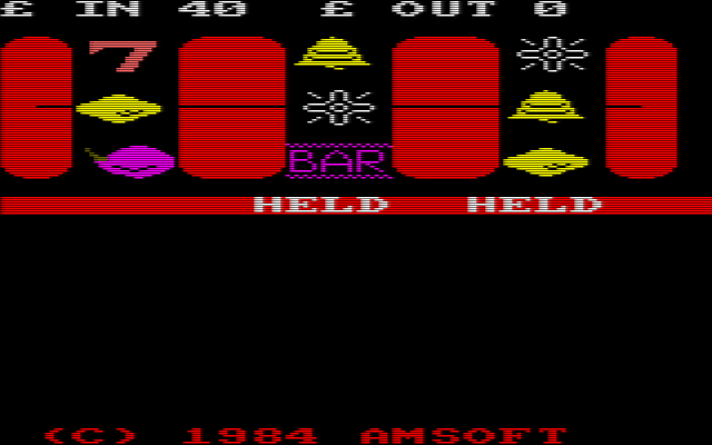 Fruit Machine (Amstrad CPC) screenshot: There's a chance of three stars here so the game automatically held reels 2 & 3