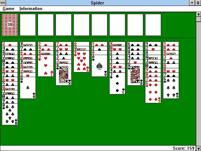 Solitaire King: Spider (Windows 3.x) screenshot: A game in progress using the variation where cards are dealt face up