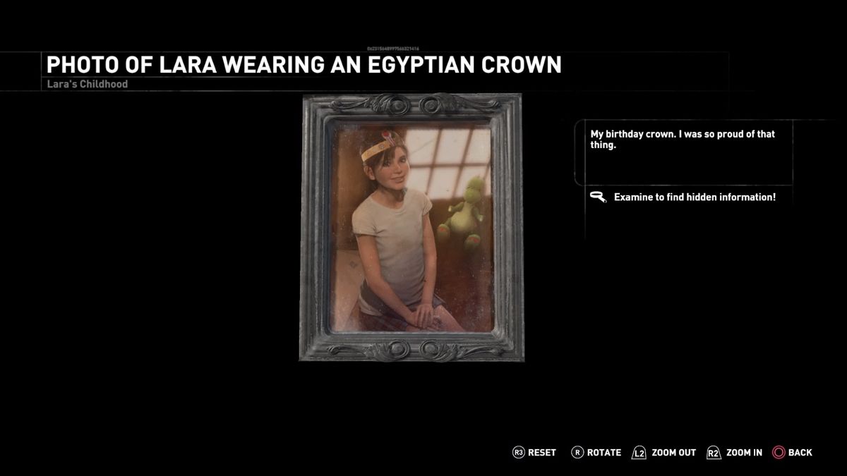 Rise of the Tomb Raider: 20 Year Celebration (PlayStation 4) screenshot: 20 Year Celebration Pack - Blood Ties - Photo of Lara wearing an Egyptian crown she made as a kid