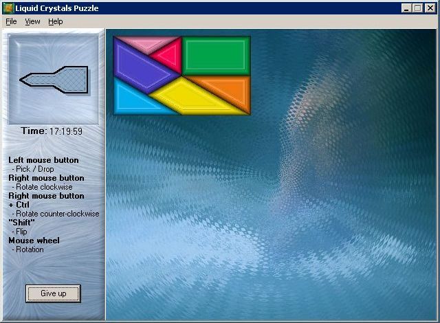 Liquid Crystals (Windows) screenshot: All puzzles start like this, the required shape in the upper left preview screen and the shales in a rectangle