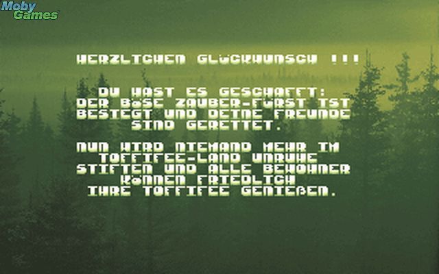 Toffifee: Fantasy Forest (DOS) screenshot: Congratulations, it's done. Everybody is saved and all are happy (german language).