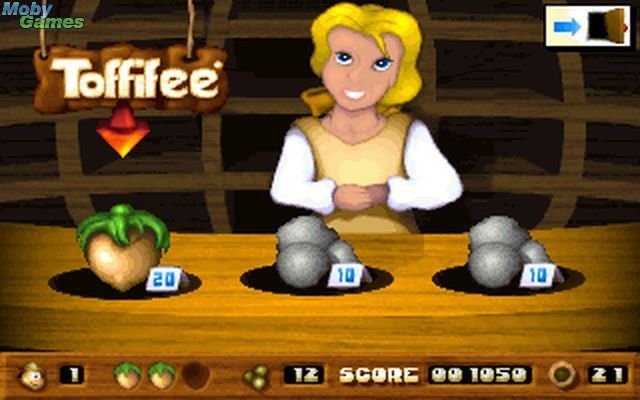 Toffifee: Fantasy Forest (DOS) screenshot: Having a break at a shop. Let's buy some nuts (hitpoints) or stones (ammo).