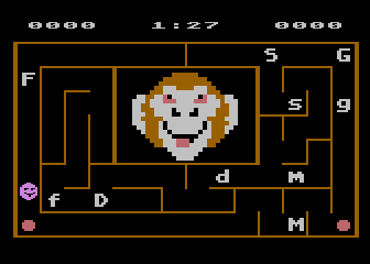 Alphabet Zoo (Atari 8-bit) screenshot: Smug purple ball character