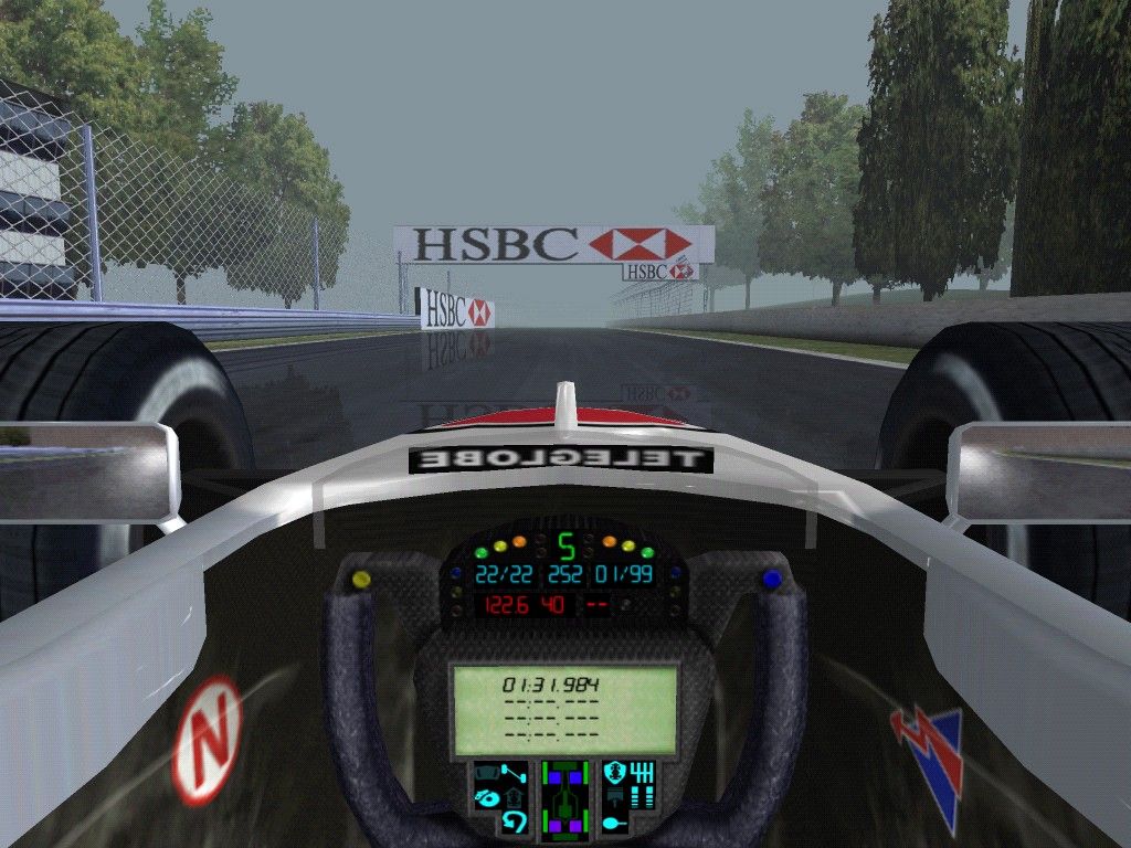 F1 Championship: Season 2000 (Macintosh) screenshot: Going through the HSBC sign.