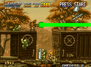 Metal Slug X (Neo Geo) screenshot: Marco points a huge laser beam to the right, and manages to destroy some enemies
