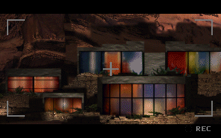 Voyeur II (DOS) screenshot: Of course the natural thing to do is to look across the canyon at the neighbour's house