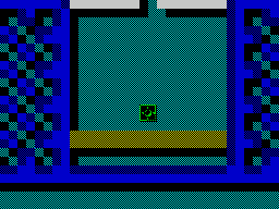 Titan (ZX Spectrum) screenshot: This allows the ball to pas through the white wall and destroy the brown bricks. Objective : destroy the white & brown bricks in all four arms of the cross
