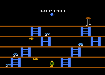 Fast Eddie (Atari 8-bit) screenshot: Level 2, you collect fish.
