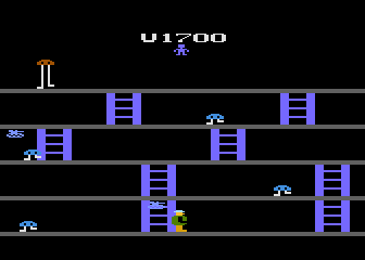 Fast Eddie (Atari 8-bit) screenshot: Level three you collect tanks.