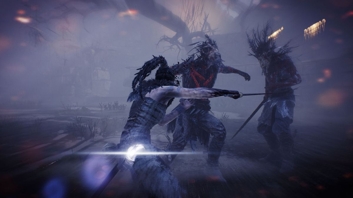 Hellblade: Senua's Sacrifice (Windows) screenshot: A powerful strike, facing two opponents at once.
