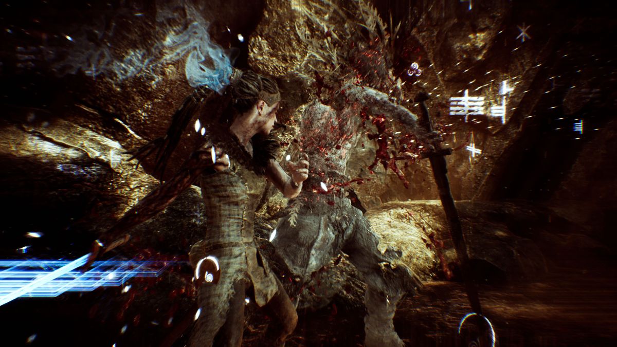 Hellblade: Senua's Sacrifice (Windows) screenshot: Blood splatters across the screen as damage is dealt.