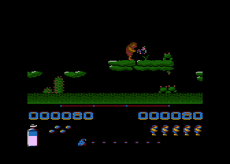 Fred (Atari 8-bit) screenshot: Spraying something noxious at the baddies