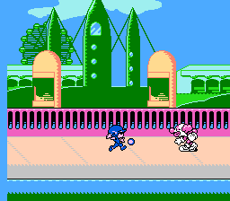 The Trolls in Crazyland (NES) screenshot: Starting a game: kicking a ball at clowns