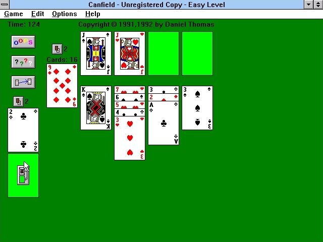 Canfield (Windows 3.x) screenshot: A game in progress