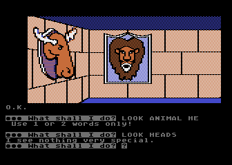 Scott Adams' Graphic Adventure #4: Voodoo Castle (Atari 8-bit) screenshot: Some heads on the wall... but apparently nothing special