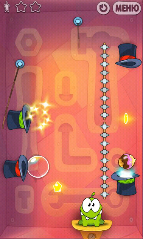 Cut the Rope (Android) screenshot: Tricky hat-portal jumping and spike-avoiding required!