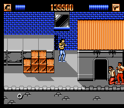 Lethal Weapon (NES) screenshot: A man holding another hostage