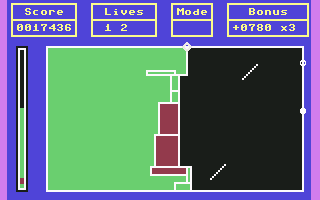 Frenzy (Commodore 64) screenshot: Making the more safety areas while evading leptons and omega particles