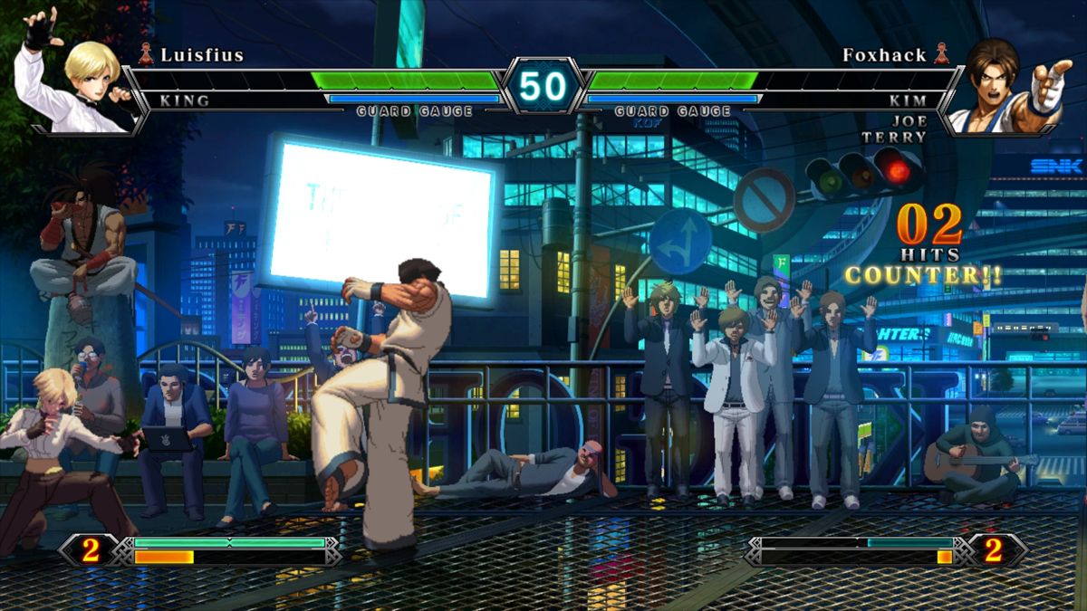 The King of Fighters XIII (Windows) screenshot: Versus matches can be played over the internet or on your computer. You play in one of multiple random stages, including recreations of classic arenas, like this one from The King of Fighters '96.