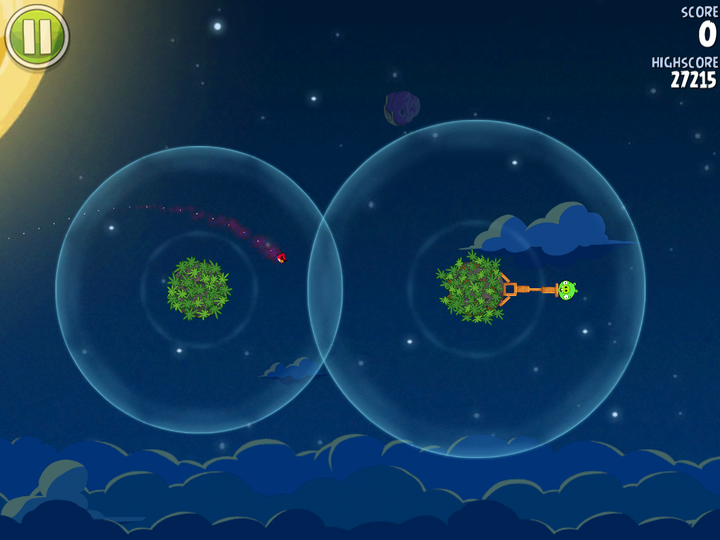 Angry Birds: Space (iPad) screenshot: Each planet has its own gravitational pull