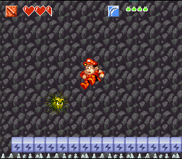 Super Adventure Island II (SNES) screenshot: Fortunately the lightning-stones are activated so that you don't fall into the spikes