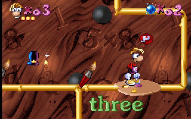 Maths and English with Rayman: Volume 3 (DOS) screenshot: The red blob with a 'P' on it is a power up that boosts Rayman's fist power.