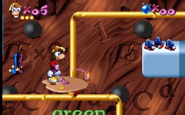 Maths and English with Rayman: Volume 3 (DOS) screenshot: Art Alley: Rayman must choose words that have similar sounds to the word spoken by the Wizard. The choice is made by hitting the paintbrush marker near the selected word.