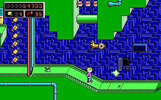 Commander Keen 5: The Armageddon Machine (DOS) screenshot: I shoot at that pesky enemy and miss. I nonchalantly leave the essential diamond behind (EGA)
