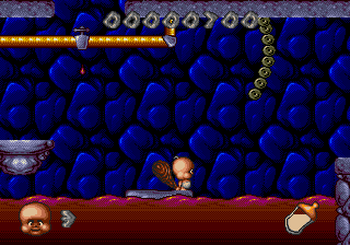 Chuck Rock II: Son of Chuck (Genesis) screenshot: In the smelly sewers