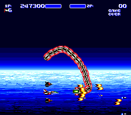 Air Buster (Genesis) screenshot: We've reached planet's orbit. This snake enemy offers a long battle