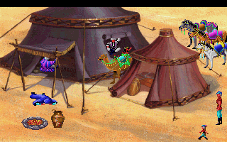 King's Quest V: Absence Makes the Heart Go Yonder! (DOS) screenshot: Graham finds the camp of the desert bandits. (CDROM version) (VGA)