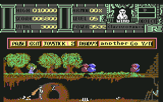 Warlock (Commodore 64) screenshot: Colourful giant snakes and a fire breathing giant