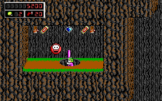 Commander Keen 4: Secret of the Oracle (DOS) screenshot: I carefully stick my head out. This enemy is guarding lots of goodies! (EGA)