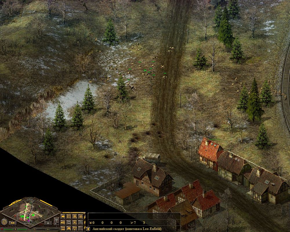 Blitzkrieg (Windows) screenshot: Allied infantry advancing towards German controlled village.