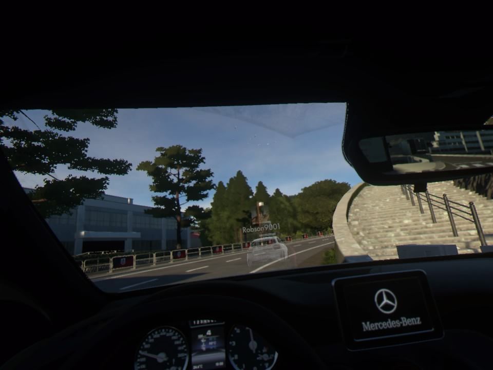 Driveclub VR (PlayStation 4) screenshot: On second lap you can see your ghost car to compare with your previous best lap driving