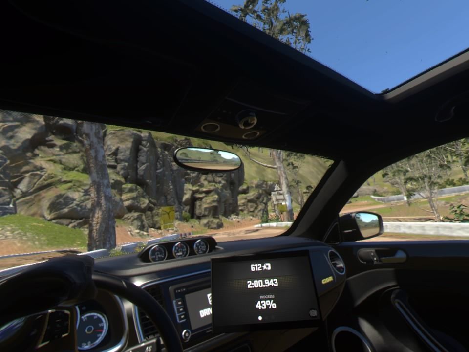 Driveclub VR (PlayStation 4) screenshot: Looking around while racing can easily cost you a crash