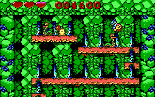 Dino Jnr. in Canyon Capers (DOS) screenshot: Jumping over a snake (EGA)