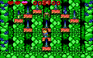 Dino Jnr. in Canyon Capers (DOS) screenshot: Avoid the jumping frog (EGA)