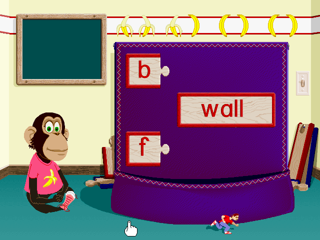 Ready, Set, Read with Bananas & Jack (Windows 3.x) screenshot: Animated surprise shows a running man on building the word 'wall'